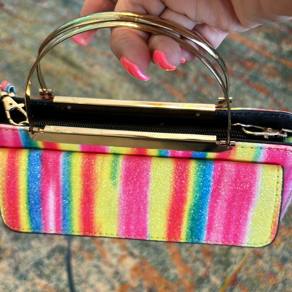 Adorable rainbow 🌈 colored clutch/strap bag